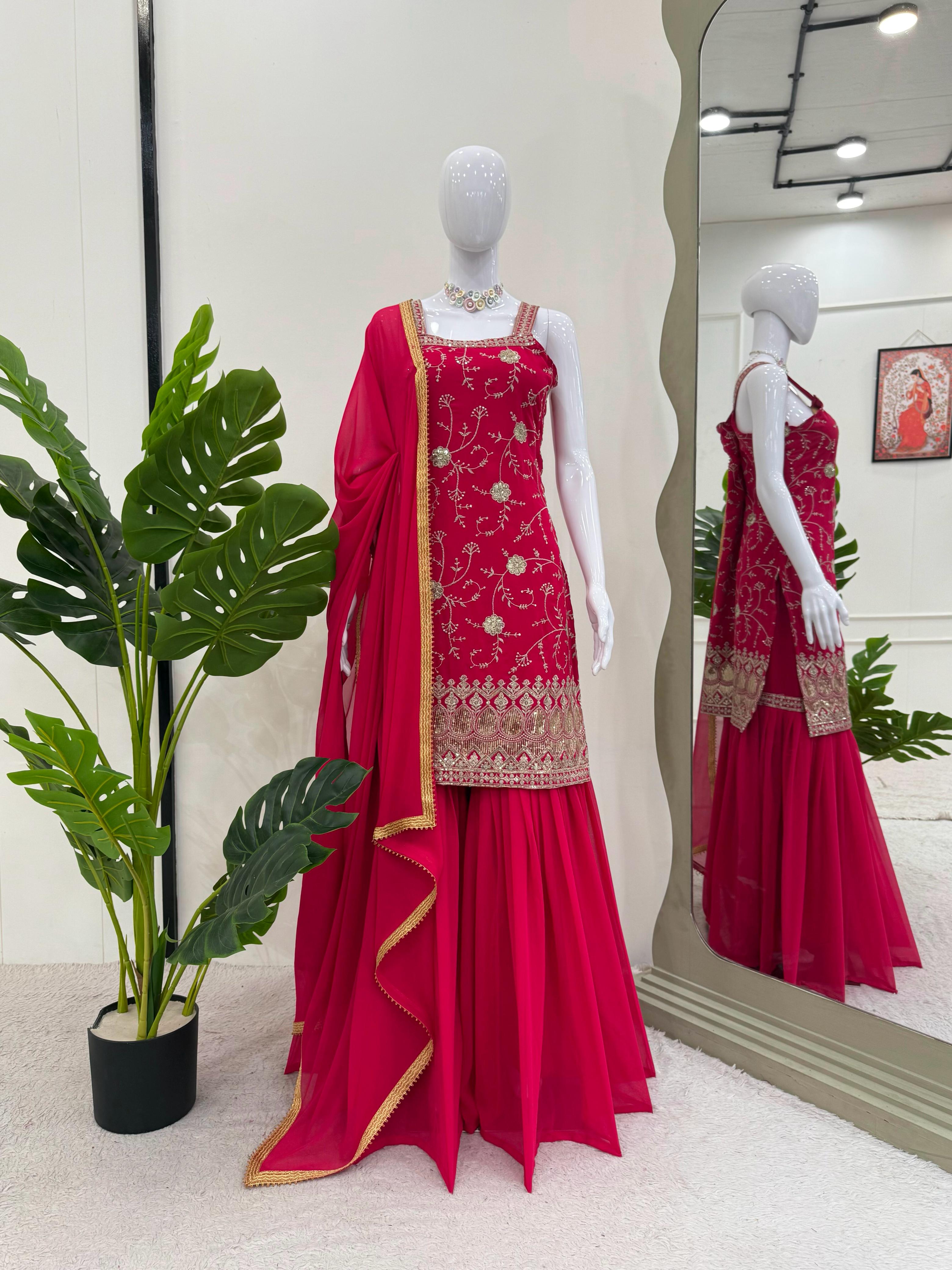 Elegant Red Traditional Ensemble with Intricate Embroidery