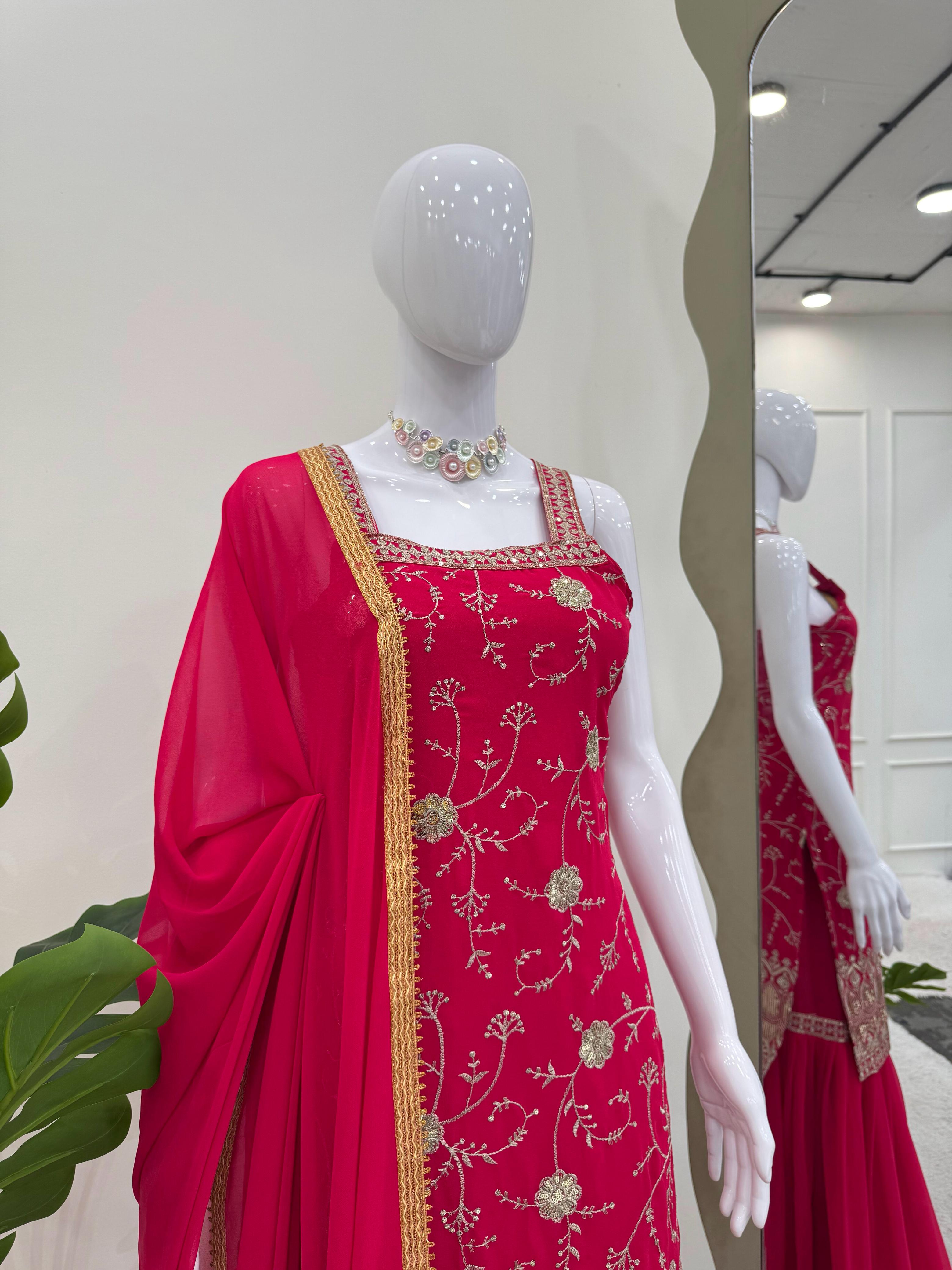 Elegant Red Traditional Ensemble with Intricate Embroidery